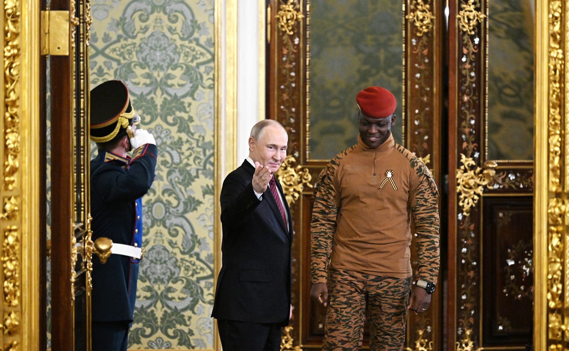 Putin meets Traore (of Burkina Faso)