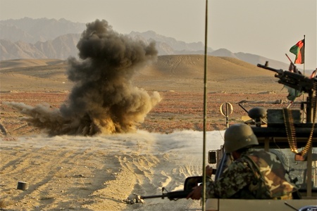 The bomb disposal team of the Afghan Army 215 Corps neutralizes an IED in Sangin, Helmand. With IEDs the largest threat in Afghanistan, the few teams that have been trained are being relied heavily on to keep the roads safe for troops and civilians. Source: The IED threat @ https://www.flickr.com/photos/aljazeeraenglish/8157503960/ Author: Al Jazeerah